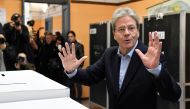 Italian Prime Minister Paolo Gentiloni, gestures after casting his ballot on March 4, 2018 at a polling station in Rome. AFP / Andreas Solaro 