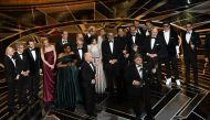 Producer J. Miles Dale (L), director Guillermo del Toro (at microphone) and cast/crew accept Best Picture for 'The Shape of Water' onstage during the 90th Annual Academy Awards at the Dolby Theatre at Hollywood & Highland Center on March 4, 2018 in Hollyw
