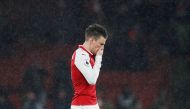 Arsenal's Laurent Koscielny looks dejected after the match REUTERS/David Klein  
