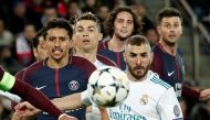 Paris Saint-Germain’s Marquinhos in action with Real Madrid’s Karim Benzema, March 6, 2018. REUTERS/Benoit Tessier 