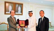 Saleh bin Hamad Al Sharqi (centre), Director-General, Qatar Chamber exchanging memento with  Shigeru Endo (left), special envoy of Japan’s Ministry of Foreign Affairs for EXPO 2025.