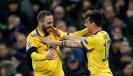 Juventus’ Paulo Dybala celebrates scoring their second goal with Gonzalo Higuain REUTERS/Eddie Keogh
