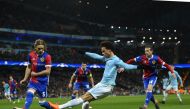 Manchester City's German midfielder Leroy Sane crosses the ball during the UEFA Champions League round of sixteen second leg football match between Manchester City and Basel at the Etihad Stadium in Manchester, north west England, on March 7, 2018. / AFP 