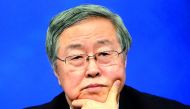 Zhou Xiaochuan, Governor of the People's Bank of China, attends a news conference on the sidelines of China's National People's Congress (NPC) in Beijing, China March 9, 2018. Reuters/Aly Song