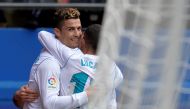 Real Madrid’s Cristiano Ronaldo celebrates scoring their second goal with team mates. REUTERS/Vincent West
