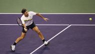 Roger Federer of Switzerland hits a forehand during his match against Federico Delbonis of Argentina during the BNP Paribas Open at the Indian Wells Tennis Garden on March 10, 2018 in Indian Wells, California. Adam Pretty/Getty Images/AFP 