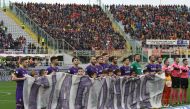Fiorentina's player hold a banner 