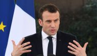 French President Emmanuel Macron gestures as he delivers a speech during a meeting with the French community resident in India at the French embassy in New Delhi on March 11, 2018.   AFP / DOMINIQUE FAGET
