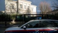 Austrian police car drives outside of the Iran ambassador's residence in Vienna, on March 12, 2018, where a 26-year-old Austrian was shot dead after he attacked a guard with a knife.  AFP / JOE KLAMAR
