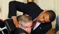 Stephen Hawking receives the Presidential Medal of Freedom from US President Barack Obama during a ceremony on August 12, 2009 in the East Room at the White House in Washington, DC  AFP / Jewel Samad