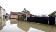 A photo taken on March 14, 2018 shows a flooded street in central Hrvatska Kostajnica, at the Croatia-Bosnia and Herzegovina border on March 14, 20018, after heavy rains and melting snow flooded the town. / AFP / 