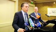 Argentina's Treasury Minister Nicolas Dujovne attends a news conference next to Germany's Finance Minister Olaf Scholz during the 2018 G20 Conference entitled 