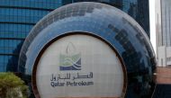 The logo of Qatar Petroleum is seen at its headquartes in Doha, Qatar, July 8, 2017. REUTERS/Stringer