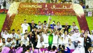 Al Sadd players and officials celebrate after winning the 2017 Qatar Cup final in Doha in this file photo. 