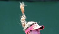 Eugenie Bouchard of Canada plays a shot against Allie Kiik during day 1 of the Miami Open at the Crandon Park Tennis Center on March 19, 2018 in Key Biscayne, Florida. Al Bello/Getty Images/AFP