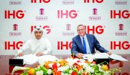 Dr Braik bin Samikh, Chairman of Tanmiyat Real Estate, and Pascal Gauvin, Managing Director, India, Middle East & Africa, IHG, sign the agreement for Crowne Plaza Doha West Bay. 
