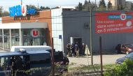 Police are seen at the scene of a hostage situation in a supermarket in Trebes, Aude, France March 23, 2018 in this picture obtained from a social media video.  La Vie A Trebes/via Reuters