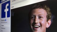 An illustration picture of the Russian language version of Facebook about page featuring the face of founder and CEO Mark Zuckerberg in a picture taken in Moscow on March 22, 2018. (AFP /  Mladen Antonov) 