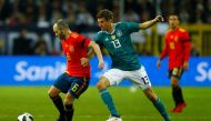 Spain’s Andres Iniesta in action with Germany’s Thomas Mueller REUTERS/Thilo Schmuelgen
