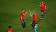 Spain’s Rodrigo celebrates with Andres Iniesta after scoring their first goal REUTERS/Wolfgang Rattay
