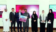 Commercial Bank officials with one of the winners of “Save & Win Campaign.” Pic: Salim Matramkot/The Peninsula