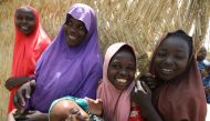 Relatives of one of the newly released Dapchi schoolgirls pose for a picture in Dapchi, in the northeastern state of Yobe, Nigeria March 22, 2018. REUTERS/Afolabi Sotunde
