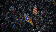 Protesters clash with riot police blocking the road leading to the central government office in Barcelona during a demonstration in Barcelona, Spain on March 25, 2018 after Catalonia's former president Carles Puigdemont was arrested in Germany by German p