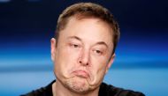 Founded 15 years ago by South African-born serial entrepreneur Elon Musk, Tesla has gained fans and acclaim as a company steering toward a world of self-driving cars running on clean energy. In this poto to  Musk pauses at a press conference following the