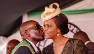 FILE PHOTO: President Robert Mugabe kissing his wife and first lady Grace Mugabe during the 37th Independence Day celebrations at the National Sports Stadium in Harare on April 18, 2017. (AFP / Jekesai Njikizana) 