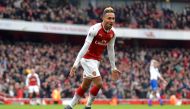 Arsenal's Gabonese striker Pierre-Emerick Aubameyang celebrates scoring the team's second goal during the English Premier League football match between Arsenal and Stoke City at the Emirates Stadium in London on April 1, 2018. AFP / Oliver GREENWOOD 