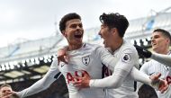 Tottenham Hotspur's English midfielder Dele Alli (L) celebrates with Tottenham Hotspur's South Korean striker Son Heung-Min after scoring their second goal during the English Premier League football match between Chelsea and Tottenham Hotspur at Stamford 