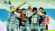 Players of Al Duhail celebrate a goal against Al Kharaitiyat in their QNB Stars League match in Doha in this file photo.