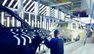 A Ford worker inspects paint work on the body of a Ford Expedition SUV at Ford's Kentucky Truck Plant in Louisville, Kentucky, U.S., February 9, 2018. Reuters/Nick Carey