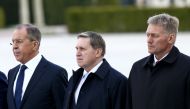 Russian Foreign Minister Sergei Lavrov (L) and Russian Presidential Spokesman Dmitry Peskov (R) attend the official welcoming ceremony of Russian President Vladimir Putin (not seen) at the Presidential Complex in Ankara, Turkey on April 03, 2018. (Ra?it A