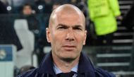 Real Madrid's French coach Zinedine Zidane attends the UEFA Champions League quarter-final first leg football match between Juventus and Real Madrid at the Allianz Stadium in Turin on April 3, 2018. / AFP / JAVIER SORIANO