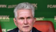 Bayern Munich's headcoach Jupp Heynckes waits ahead the German first division Bundesliga football match FC Augsburg vs FC Bayern Munich in Augsburg, southern Germany, on April 7, 2018.  AFP / Christof STACHE