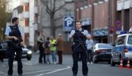 Police stands guard in a street near a place where a man drove a van into a group of people sitting outside a popular restaurant in the old city centre of Muenster, Germany, April 7, 2018. REUTERS/Leon Kuegeler