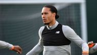 Liverpool's Dutch defender Virgil van Dijk attends a team training session on the eve of the UEFA Champions League first leg quarter-final football match between Liverpool and Manchester City, at Melwood Training Ground in Liverpool, north west England on