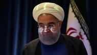 File photo of a video projection seen on the face of Iran's President Hassan Rouhani as he arrives for a news conference during the United Nations General Assembly in New York City, US September 20, 2017. REUTERS/Stephanie Keith/File Photo
