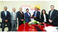 P Kumaran (third left), Ambassador of India to Qatar; with K M Varghese (centre), President of Indian Business and Professionals Council (IBPC); Rajesh Nair (third right), Managing Director, Trans Media International; and other officials during a function