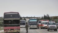 Vehicles of 17th convoy carrying civilians from Syria’s Eastern Ghouta district, arrive in Al-Bab district escorted by ambulances, in Aleppo in Syria on April 10, 2018. Beha el Halebi - Anadolu
