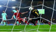 Roma’s Edin Dzeko (centre) scores their first goal  against Barcelona during the UEFA Champions League Quarter Final Second Leg match played at the Stadio Olimpico in Rome, Italy. Reuters / Alessandro Bianchi