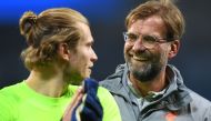 Liverpool's German goalkeeper Loris Karius (L) and Liverpool's German manager Jurgen Klopp react following the UEFA Champions League second leg quarter-final football match between Manchester City and Liverpool, at the Etihad Stadium in Manchester, north 