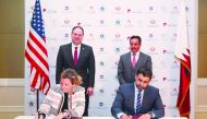 Sheikh Khalifa bin Jassim Al Thani (right), Chairman of Qatar Chamber; and Robert Cresanti (left), President and CEO of the International Franchise Association, look on as Abdulaziz bin Nasser Al Khalifa (right, sitting), QDB Chief Executive Officer;and L