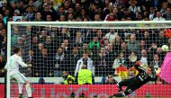 Real Madrid's Portuguese forward Cristiano Ronaldo shoots a penalty kick to score a goal during the UEFA Champions League quarter-final second leg football match between Real Madrid CF and Juventus FC at the Santiago Bernabeu stadium in Madrid on April 11