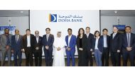 Dr R Seetharaman (fourth left), Doha Bank CEO and other bank officials with the visiting Singapore business delegation, at Doha Bank headquarters yesterday.