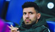 Manchester City's Argentinian striker Sergio Aguero sits on the bench ahead of the UEFA Champions League second leg quarter-final football match between Manchester City and Liverpool, at the Etihad Stadium in Manchester, north west England on April 10, 20