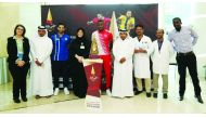 Hamad Medical Corporation  (HMC) officials and employees during the Qatar Cup Trophy Tour to HMC yesterday.