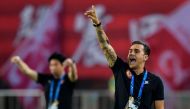 Guangzhou Evergrande's head coach Fabio Cannavaro gestures during the AFC Champions League group stage football match between China's Guangzhou Evergrande and Japan's Cerezo Osaka in Guangzhou in China's southern Guangdong province on April 17, 2018. AFP