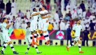 Al Sadd players celebrate their win over Al Rayyan in the Qatar Cup at Al Sadd Stadium in Doha yesterday.